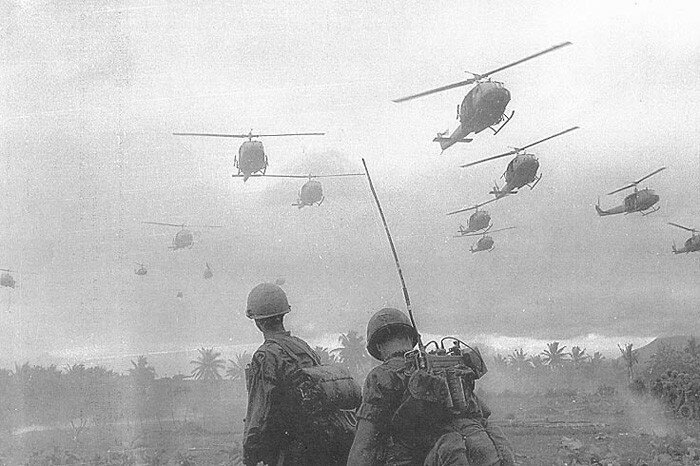 Troopers of the First Cavalry Division watch as a squadron of Huey helicopters prepares to touch down. The First Cav played an innovative role in developing the air assault tactics used in Vietnam and today.