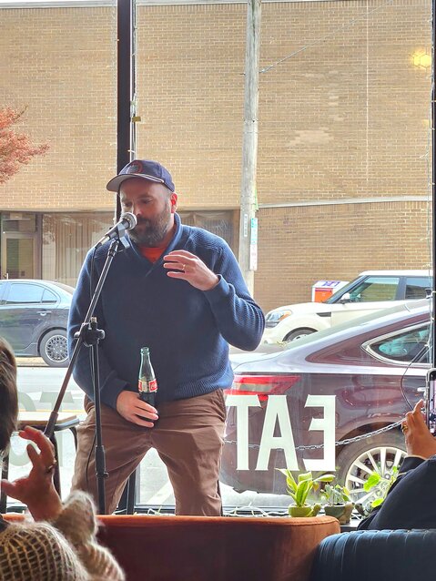 Chase Dearinger, associate professsor of English at Pittsburg State University, talks about how the horror film &quot;The Texas Chainsaw Massacre&quot; inspired him to write gothic southern&nbsp; stories during Second Saturday event at Toast.&nbsp;