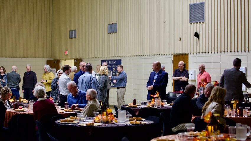 Girard area business and organization representatives mingle and chat during the social hour at the St. Michael&rsquo;s Parish Hall Thursday night for the Girard Area Community Foundation&rsquo;s annual grant awards banquet.