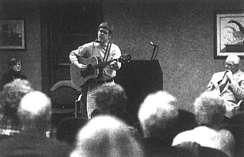 Pittsburg State professor Don Viney performs folk songs collected by Pittsburg native Vance Randolph during a celebration of the Pittsburg Library&rsquo;s 97th birthday. Jan O&rsquo;Connor, left, and Charles Cable, right, also performed.