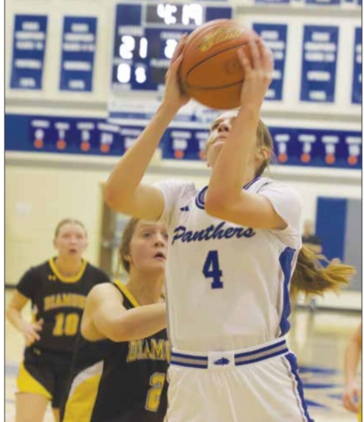 Colgan senior Lily Brown lifts off for two of her game-high 27 points against Diamond on Jan. 2