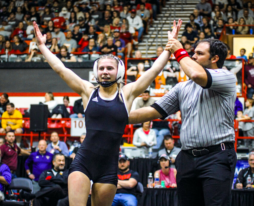 Frontenac 105-pound freshman Harper Holmes won the first state title in the brief history of the Frontenac girls wrestling program with a fall against Coffeyville senior Emma Hall last Saturday in the Class 4-1A state tournament at the Tony&rsquo;s Pizza Events Center in Salina. COURTESY AMANDA MORRISON