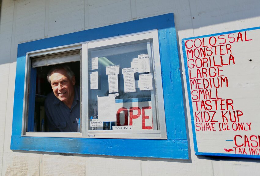 Dave&rsquo;s Tropical Sno owner David Schaper takes a break from making sno cones on opening day, Friday. The business is located at 1630 S. Broadway.