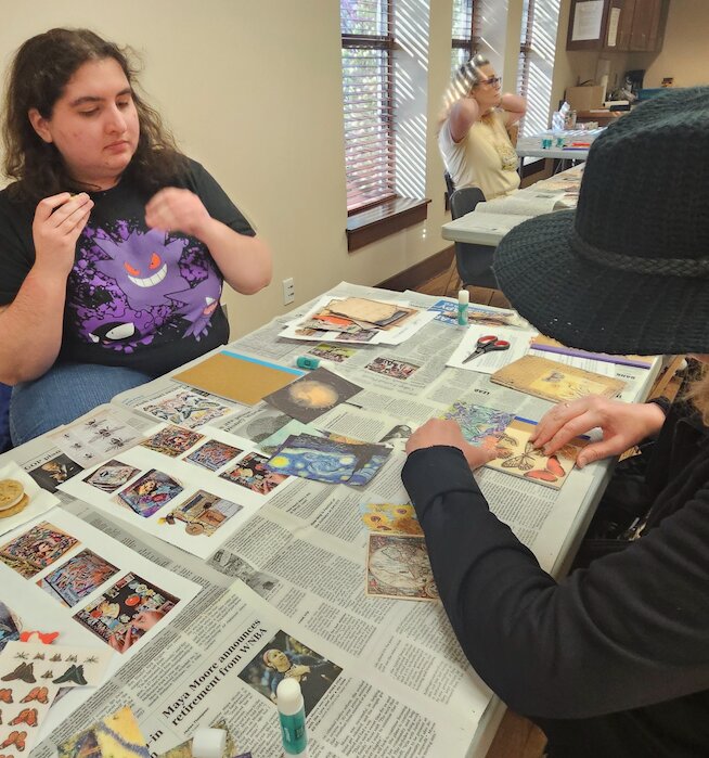 This month's Pittsburg Public Library iCraft was decoupage journals. Patrons were given a journal and a choice of many beautiful art pictures and decorative elements for their journal Wednesday evening.&nbsp;