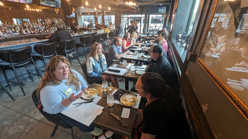 Members and non-members of the Pittsburg Area Young Professionals gathered at Brick + Mortar Thursday evening for &ldquo;Speed Networking,&rdquo; a structured networking event designed to facilitate quick and efficient introductions and interactions between participants.