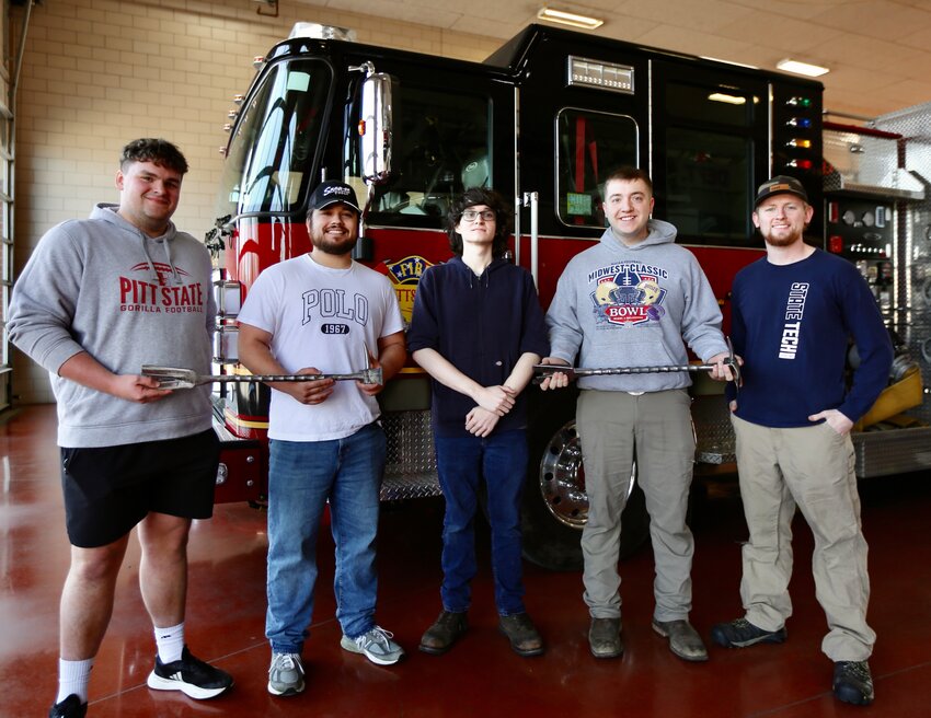 On Friday, a group of Pittsburg State University Engineering Technology students visited the Pittsburg Fire Department for some expert advice on a tool they have designed and created. The Halligan bar, a multi-purpose tool used by firefighters and first responders, was poured by Monett Metals, Inc., and will be the students&rsquo; entry in the upcoming 2024 Cast in Steel Competition in Milwaukee. From left are students Even Taylor, Seth Phillips, Rhys Stroker, Colton Hutchcraft, and Morgan Volkmann.