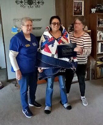 U.S. Navy veteran Danielle Salazar of Columbus received her Quilt of Valor on March 23, 2024, for her service aboard the USS Blue Ridge as a Fireman.