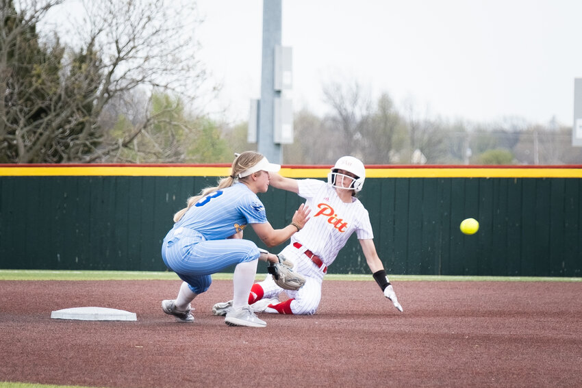Hannah Burnett, Pittsburg State University softball player, slides toward the base at the game against Nebraska-Kearney on March 29.