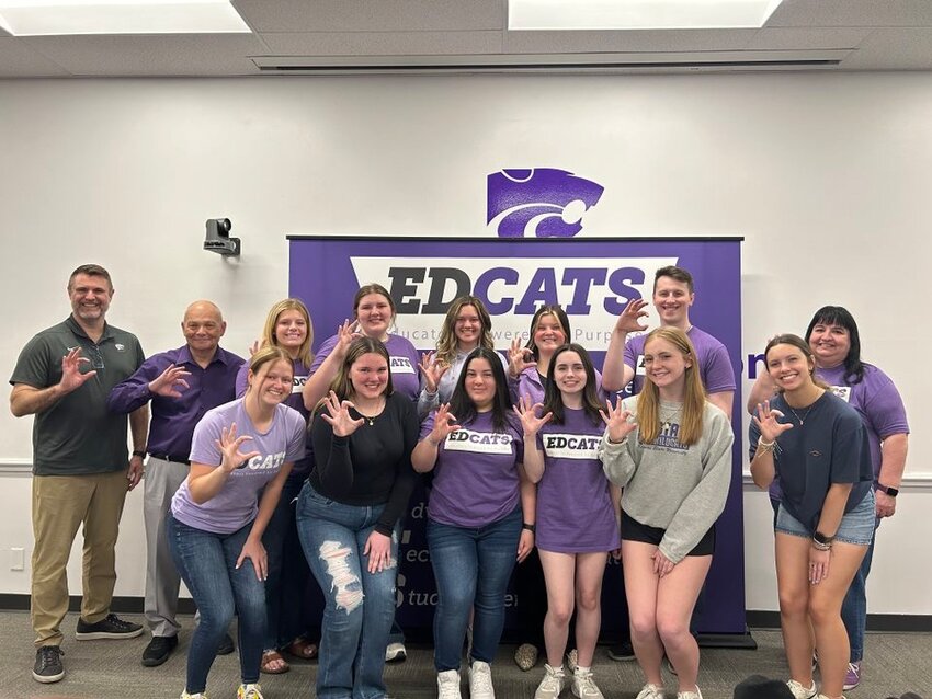 The newly formed ED ASTRA group at Kansas State University aims to tackle the issue of teacher shortages in rural communities. Pictured within the group is Girard native/first chair president Zoe Rhodes (back row, third from right) and Frontenac native/second chair president Eli Tinsley (back row, second from right).