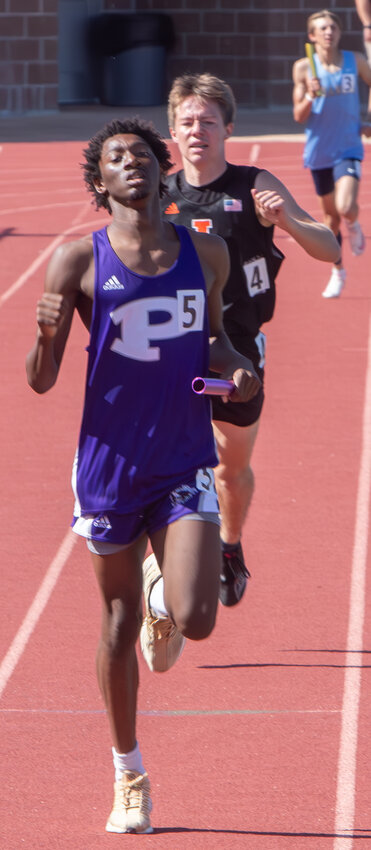 Pittsburg junior Armontraze Weathersby runs the leg of a relay Thursday at the Southeast Kansas League meet in Independence. COURTESY PHOTO