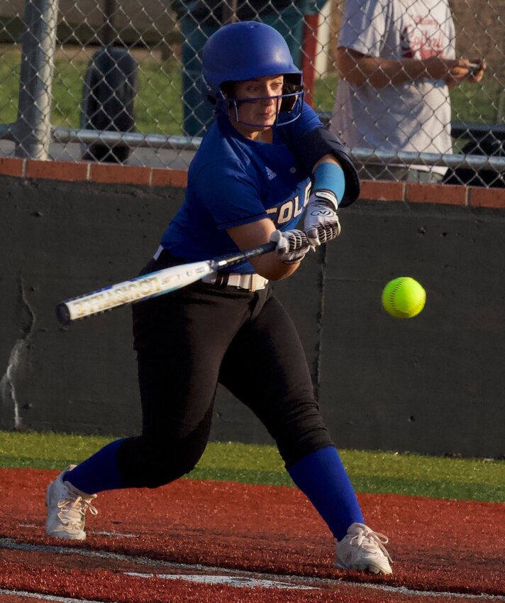 St. Mary&rsquo;s Colgan senior Ava Wilson connects with a pitch to start the Class 2-1A regional championship Tuesday against Northeast. BROCK SISNEY / THE MORNING SUN