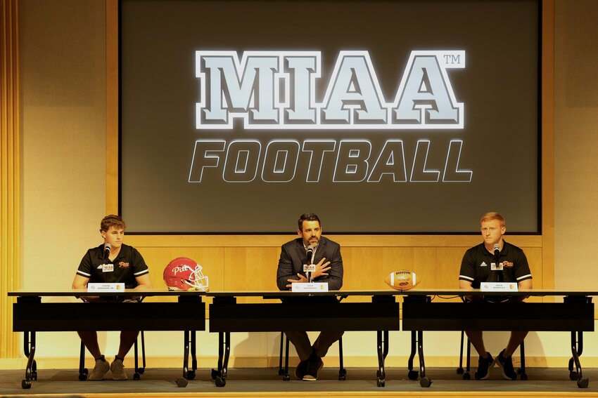 Pittsburg State quarterback Chad Dodson, coach Tom Anthony and linebacker Jack Barkley (left to right) answer questions during the MIAA Football Media Day on Tuesday in Kansas City, Mo.