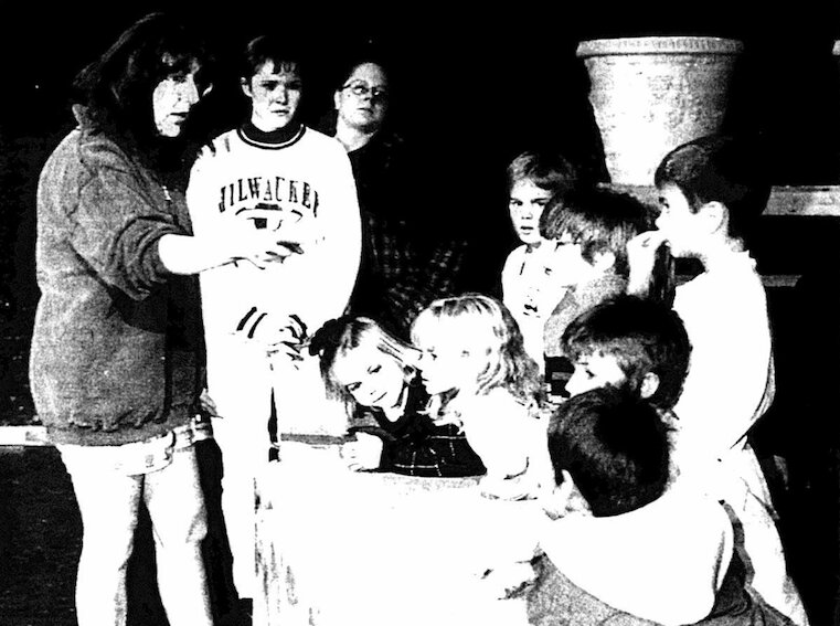 Director Jannell Robinson, left, instructs a group of munchkins during rehearsals for the Pittsburg Community Theatre production of&nbsp; &lsquo;The Wizard of Oz&rsquo;.