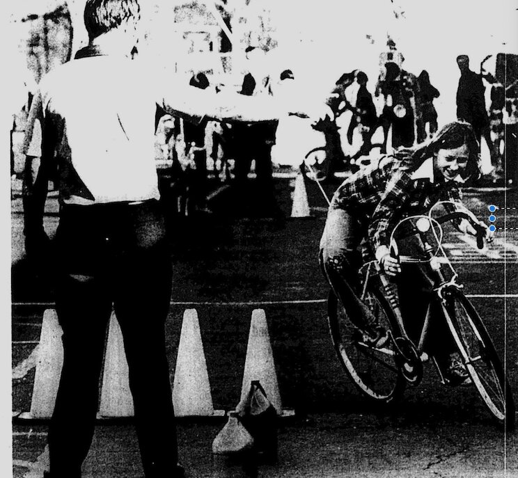TEST ALERTNESS &mdash; Dawn Briggs, student at Westside, swerve bicycle in repsonse to a signal from Glenn bliss, PE instructor.