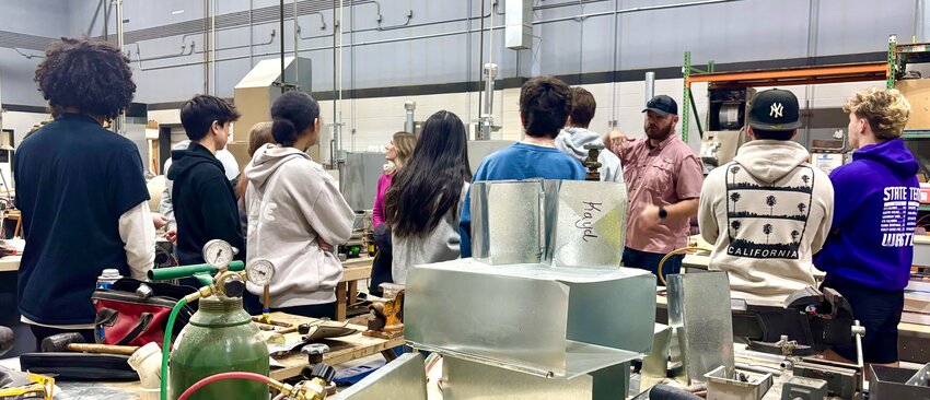 Southeast Kansas Career and Technical Education Center of Crawford County (CTEC) Executive Director Dan Boley offers a tour to Pittsburg High School students Friday morning, showing them a variety of career opportunities.