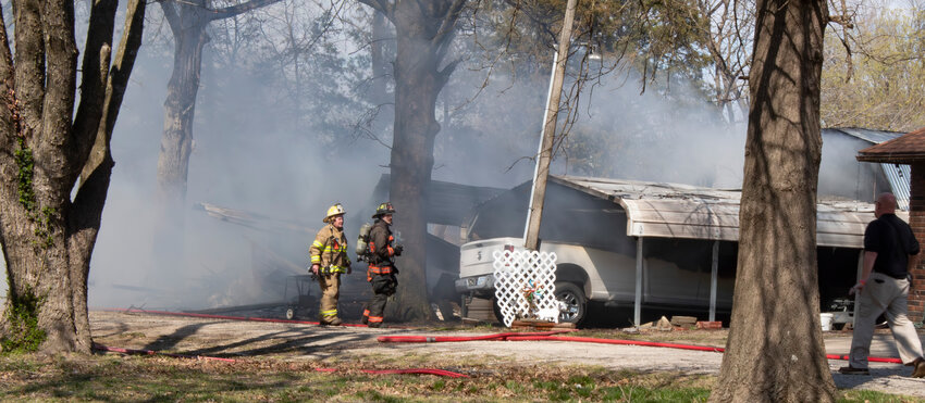 Multiple fire districts responded to a fire in Mulberry Wednesday, March 26 at the intersection of 1st and Kansas Streets. Arma, Frontenac, and Arcadia Fire districts responded a call shortly after 3 p.m. Arma Chief Mike McLeod said he believes the the residents were having a controlled burn in a barrel that ended up spreading to the garage and two other structures. Fire fighters were able to stop the fire before it reached the house. Wind conditions also flames to spread to the neighbor&rsquo;s backyard.  The incident is still under investigation.