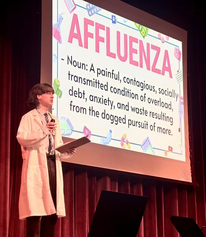 Pittsburg High School student Leo Norman provides a presentation on &ldquo;affluenza&rdquo; during Wednesday&rsquo;s TEDx Talk event held at the Pittsburg High School auditorium, which featured 10 speakers.