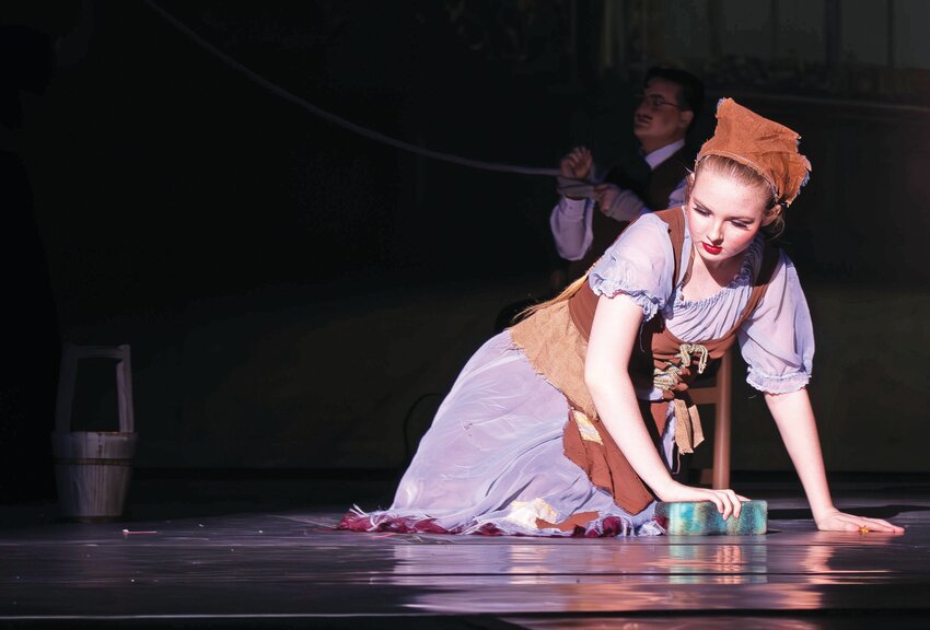 Cinderella, played by Ashtyn Brodrick, scrubs the floor in &ldquo;Cinderella.&rdquo; This is the fifth time Midwest Regional Ballet has performed the classic ballet.