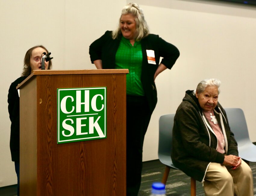 Terri, left, and Bootsie, right, share their experiences with Mosaic alongside Mosaic Home Manager Tara Fairchild during Wednesday&rsquo;s &ldquo;Partners in Possibilities&rdquo; luncheon and fundraiser held at the John U. Parolo Education Center on the campus of the Community Health Center of Southeast Kansas.