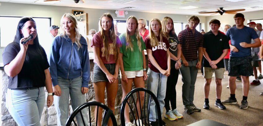 Girard High School Class of 2025 students Graci Murphy, Emily Ferguson, Jeriah Adolph, Natalia Onelio, Connor Hudson, Karlyn Fisher, Levi Blair, Ranson Born, and Sylar Sammons introduced themselves to their crowd at Friday&rsquo;s Fallen Trojan Memorial Golf Tournament held at Crawford Hills Golf Course. Each received a $1,000 scholarship.
