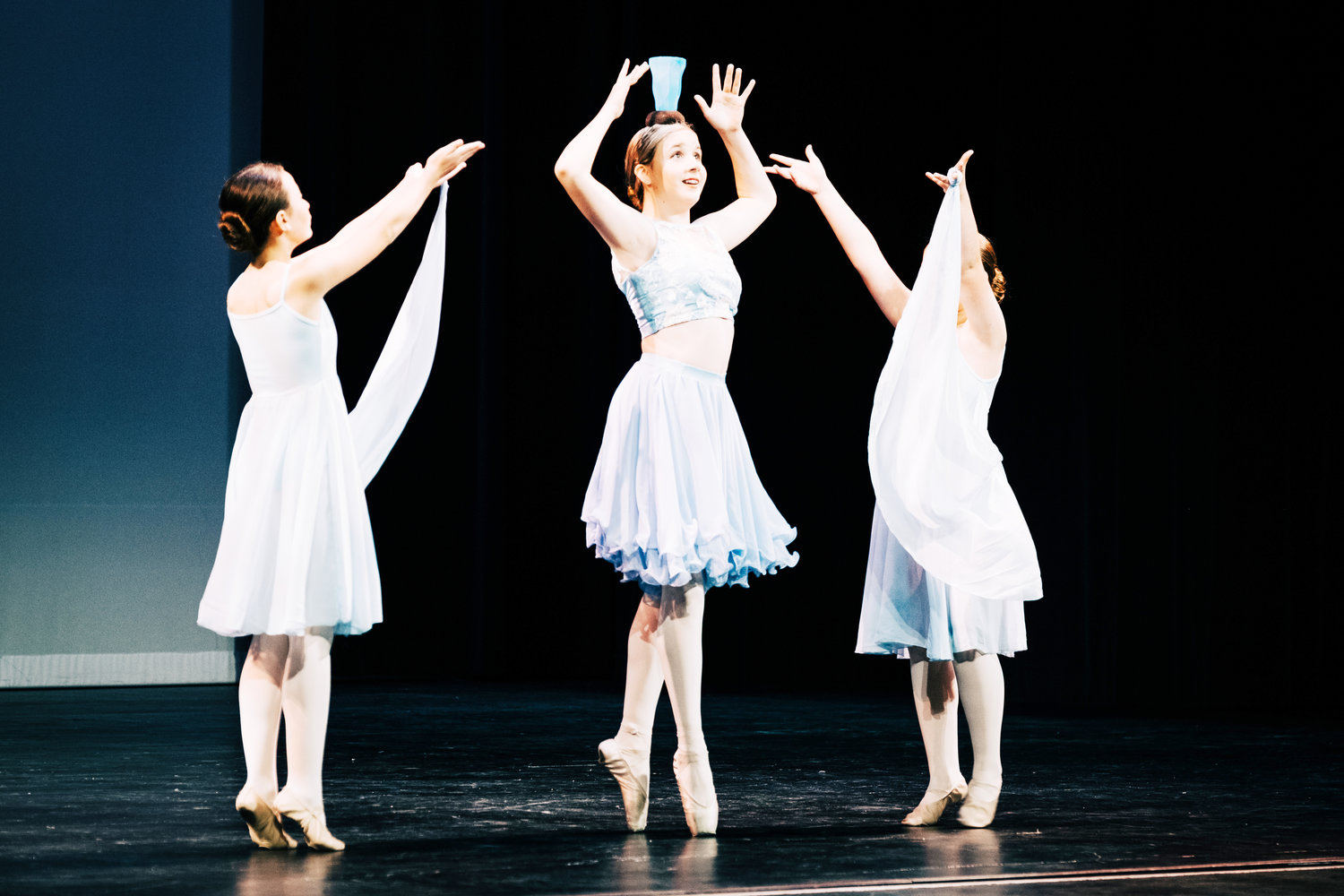 Pittsburg Ballet students Kayla Hutchison, Bailey Wilkes and Scarlet Mccullough perform “La Bayadere Danse Manu” as choreographed by Marius Petipa as part of Pittsburg Ballet’s Spring Showcase at Memorial Auditorium on Thursday.