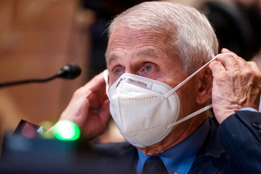FILE - Dr. Anthony Fauci, director of the National Institute of Allergy and Infectious Diseases, listens during a Senate Appropriations Subcommittee on Labor, Health and Human Services, and Education, and Related Agencies hearing on Capitol Hill in Washington, Tuesday, May 17, 2022. Fauci, who is fully vaccinated and has received two booster shots, tested positive for COVID-19, and was experiencing mild coronavirus symptoms, according to a Wednesday, June 15, 2022, press release posted by the NIH. (Shawn Thew/Pool Photo via AP, File)