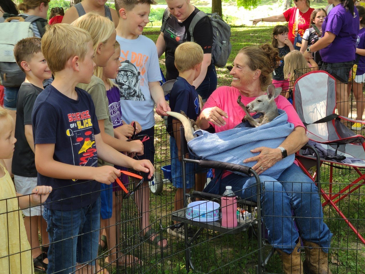 Kramer Livestock and Petting Zoo brought a one-year-old kangaroo named Wiggles for the children to see in Lincoln Park at the Pittsburg Public Library-sponsored event.