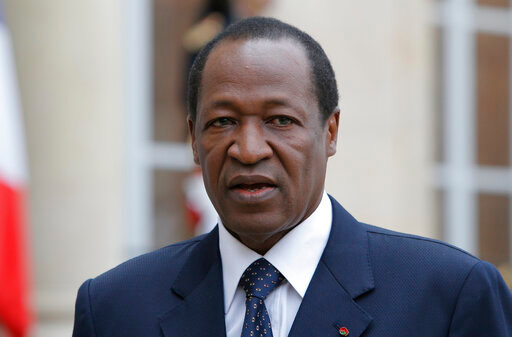FILE - Burkina Faso President Blaise Compaore speaks to the media after a meeting with France's President Francois Hollande at the Elysee Palace in Paris, Sept. 18, 2012. Compaore, who was ousted in a popular uprising in 2014, returned to Burkina Faso for the first time on Thursday, July 7, 2022. (AP Photo/Francois Mori, File)