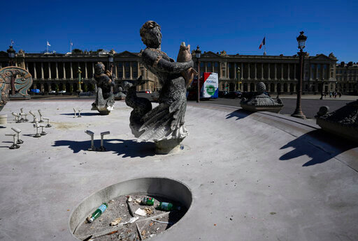 The fountains of Concorde plaza are empty in Paris, France, as Europe is under an extreme heat wave on Wednesday, Aug. 3, 2022. Paris' regional authorities warned residents to be vigilant Wednesday, with temperatures soaring to 36 degrees Celsius (97 Fahrenheit). (AP Photo/Francois Mori)
