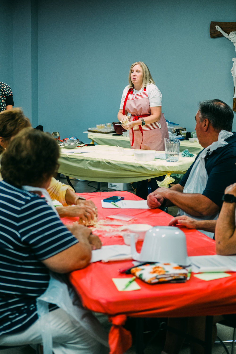 Angela Meyer instructs how to knead pasta dough during the inaugural Little Balkans Cooking School on Monday. Each participant received a recipe book. The class was a Little Balkans Days 2022 passport event.
