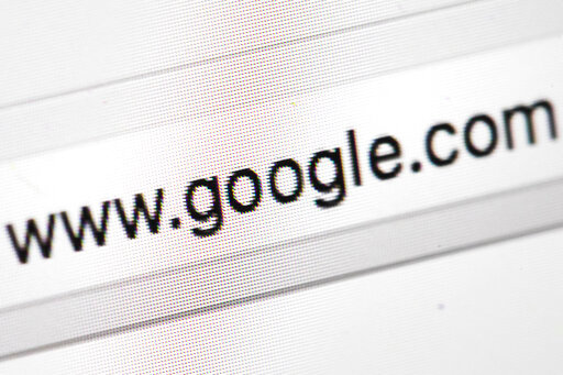 Google's web address, is displayed on a screen in Philadelphia, April 26, 2017. Google has discontinued its Google Translate services in mainland China, removing one of the company’s few remaining services that it offered to consumers in a country where most Western social media platforms are blocked. (AP Photo/Matt Rourke, File)