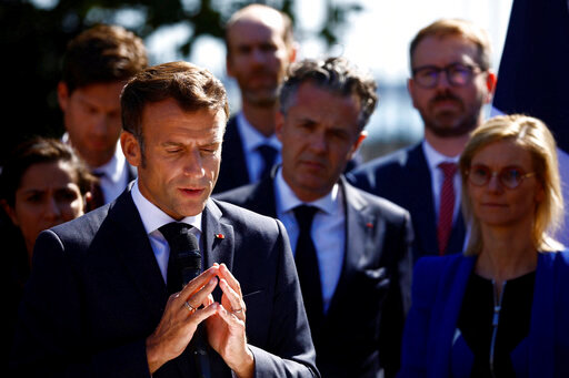 French President Emmanuel Macron delivers a speech at the Sub-Prefecture in Saint-Nazaire after a visit at the Saint-Nazaire offshore wind farm, off the coast of the Guerande peninsula in western France, Thursday, Sept. 22, 2022. (Stephane Mahe/Pool photo via AP)