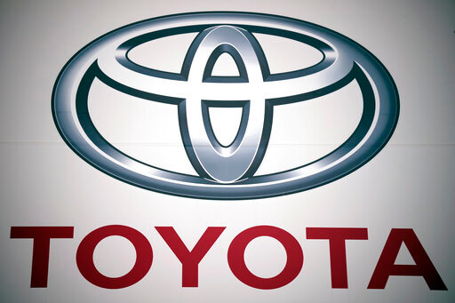 FILE - A logo of Toyota Motor Corp. at a dealer Wednesday, May 11, 2022, in Tokyo. Toyota said Thursday, Oct. 6, 2022, that it has identified how to fix its 2023 model year bZ4X crossover electric vehicles after recalling 2,700 of them in June out of concern wheel bolts might become loose, risking a crash. (AP Photo/Eugene Hoshiko, File)