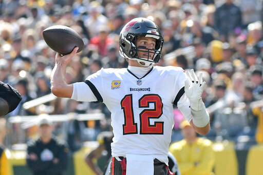 Tampa Bay Buccaneers quarterback Tom Brady (12) throws a pass during the first half of an NFL football game against the Pittsburgh Steelers in Pittsburgh, Sunday, Oct. 16, 2022. (AP Photo/Don Wright)