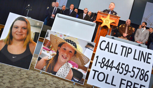 FILE - Indiana State Police Peru Post Public Information Officer Tony Slocum provides the latest details of the investigation into the murders of teenage girls Liberty German, left, and Abigail Williams in Delphi, Ind., Feb. 22, 2017. Police investigating the unsolved slayings of the two teenage girls killed during a 2017 hiking trip in northern Indiana said Friday, Oct. 28, 2022, they will hold a news conference Monday, Oct. 31, to provide an update on their investigation. (J. Kyle Keener/The Pharos-Tribune via AP, File)