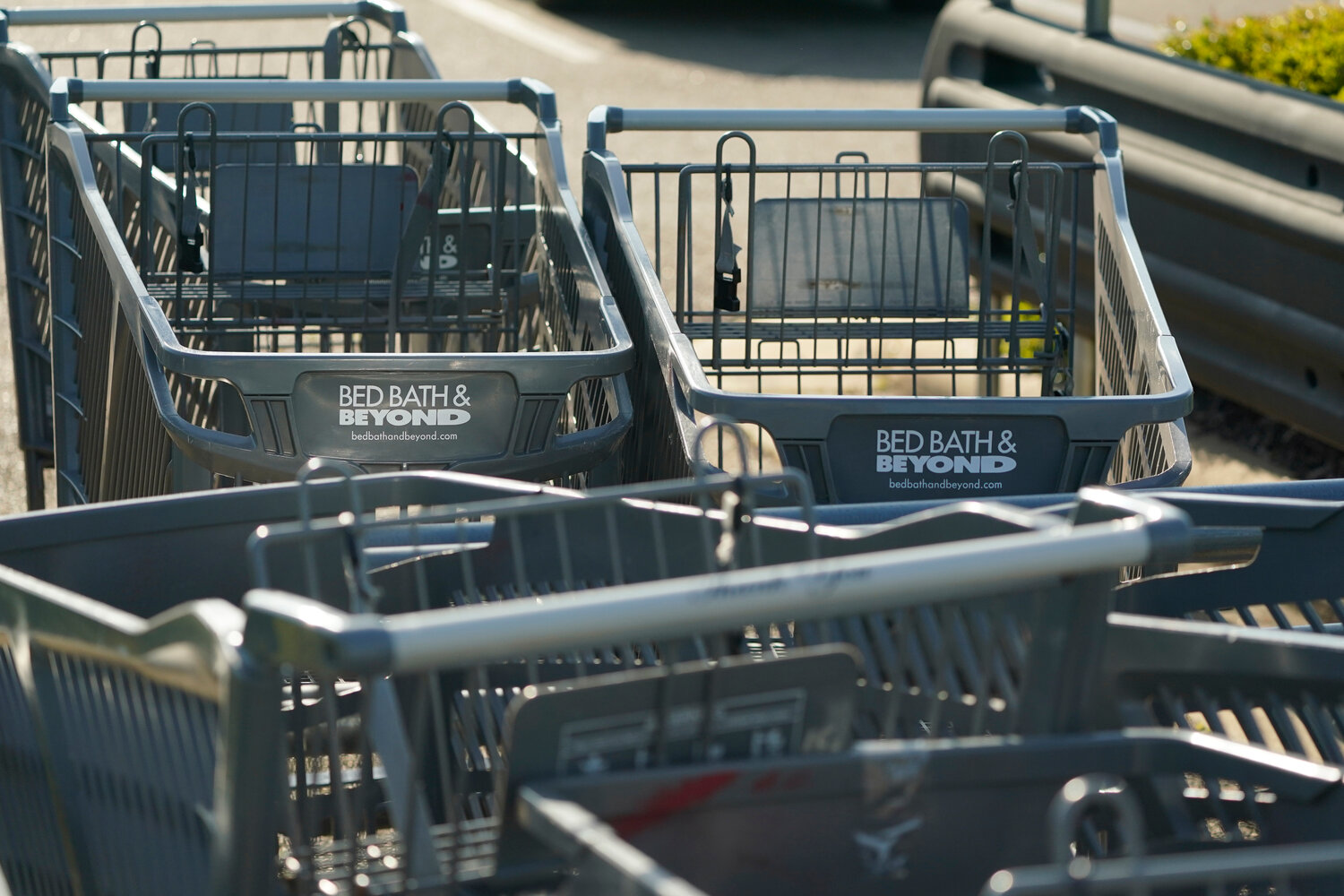 Bed Bath & Beyond shopping carts are left in a corral in Flowood, Miss., on Monday, April 24, 2023. One of the original big box retailers, the company filed for bankruptcy protection on Sunday, April 23, following years of dismal sales and losses. (AP Photo/Rogelio V. Solis)