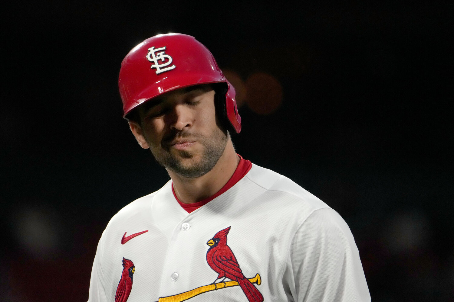 St. Louis Cardinals' Dylan Carlson heads back to the dugout after flying out during the fifth inning of a baseball game against the Los Angeles Angels Tuesday, May 2, 2023, in St. Louis. (AP Photo/Jeff Roberson)
