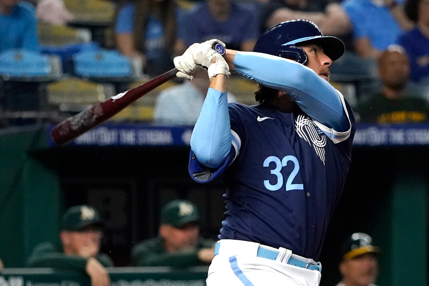 Kansas City Royals' Nick Pratto hits a two-run home run in the fourth inning against the Oakland Athletics during a baseball game Friday, May 5, 2023, in Kansas City, Mo. (AP Photo/Ed Zurga)