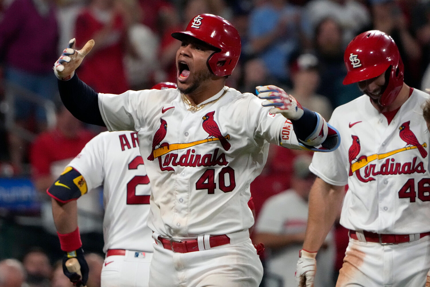 St. Louis Cardinals' Willson Contreras (40) celebrates after hitting a three-run home run during the eighth inning of their game against the Los Angeles Dodgers on Thursday night in St. Louis. (AP Photo/Jeff Roberson)