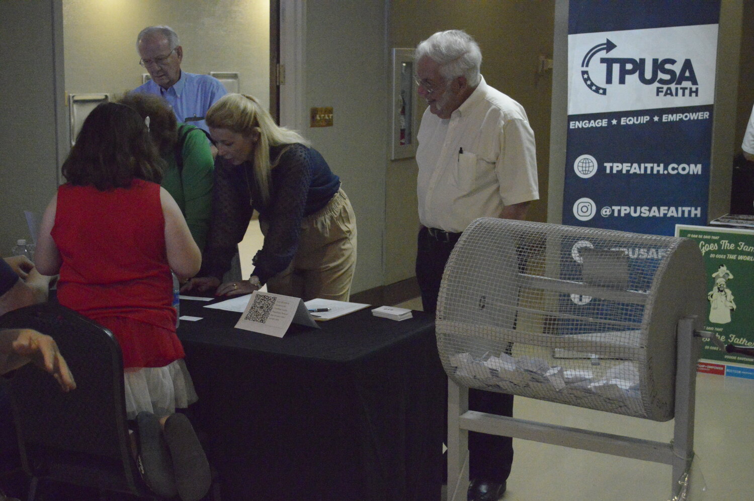 Some attendees of the Crawford County Republican Party’s Dinner and Discussion event Saturday, May 20 at Pittsburg’s Memorial Auditorium participated in a raffle drawing, hoping to win either a rifle or a shotgun.