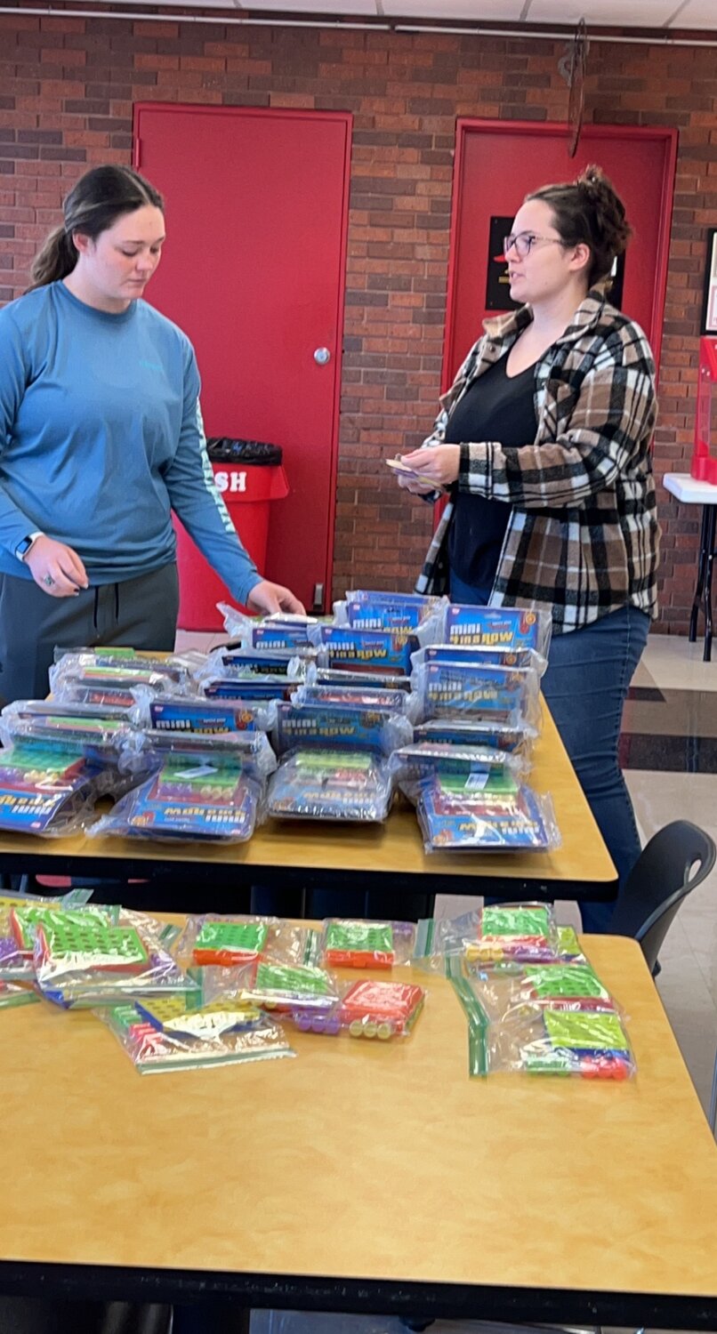 Brookland Tinker, from Walnut, Kansas and Haley Farran from Girard, Kansas, members of the Tau Theta, Phi Theta Kappa (PTK) Chapter at Labette Community College, packaged action items for the Activity Boxes for local elementary schools. The Civic Scholar: Phi Theta Kappa Journal of Undergraduate Research selected LCC’s PTK Honors in Action Project to be published in the 2023 Fall edition.