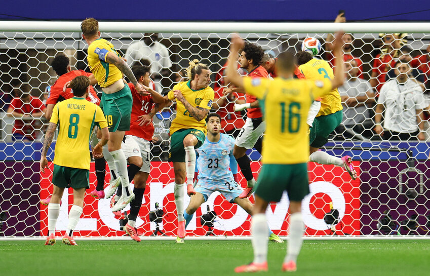 Egypt's Mohamed Hany scores an own goal, Australia's first