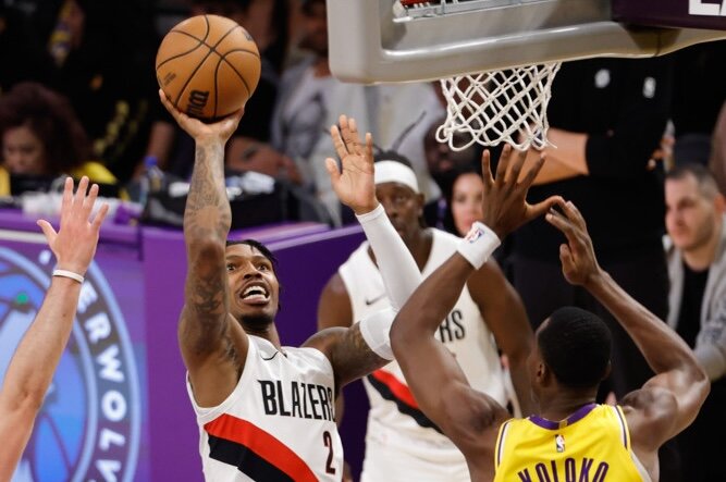 Report: Sixers sign Caleb Love, Rayan Rupert to two-way deals