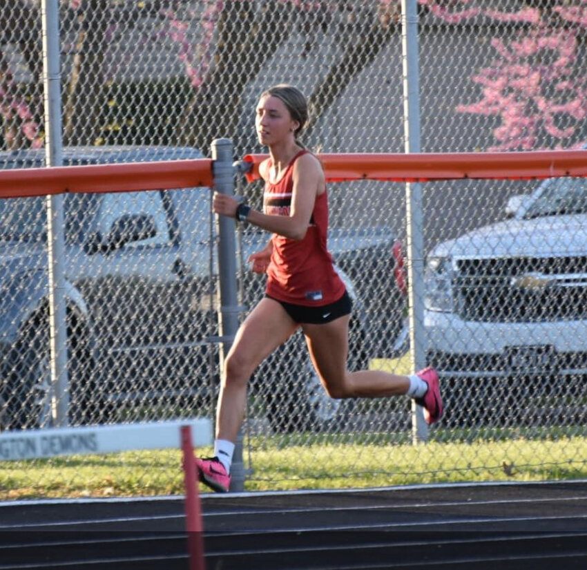 Hailey Kemper runs in a relay in 2023. Her 1:09.6 time was tops in the 400-hurdles and gives her a top 40 time in the state at the Panther Relays Monday night.