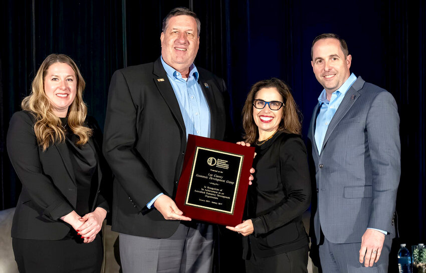 Lee County Economic Development Group's Emily Benjamin, left, and Dennis Fraise, second from left, were presented with the IEDC accreditation in Washington D.C. earlier this month.