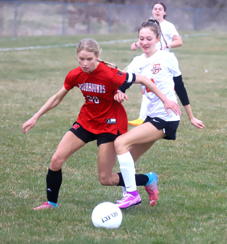 Fort Madison's Teagan Snaadt pushes past a Mediapolis defender in the first half of Thursday's 4-0 win over the Bullettes. Snaadt had one goal in the win.