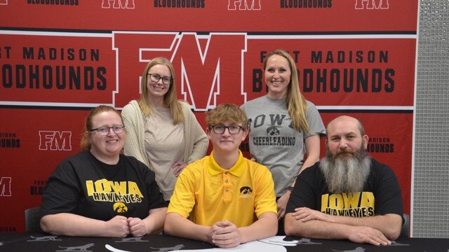 Fort Madison senior Jed Brewster signed his letter of intent to cheer for the University of Iowa recently at Fort Madison High School.