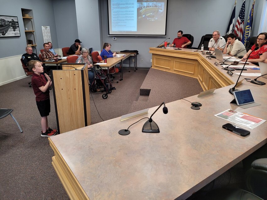 Benny Womack, a 7-year-old rail fanatic from Fort Madison, takes about five minutes of time from the Fort Madison City Council to talk rail economics and its local impact.