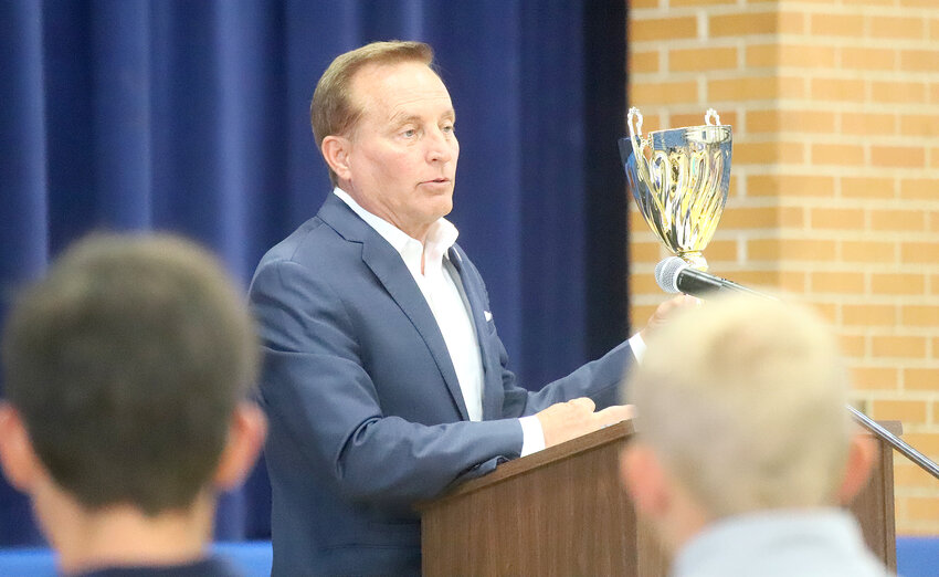 Iowa Secretary of State Paul Pate visited Holy Trinity Catholic Thursday morning to present the Carrie Chapman Catt award to the school for its 94% voter registration of eligible students. Pate challenged the underclassman to continue the strong performance as part of the Senior Class Awards Ceremony