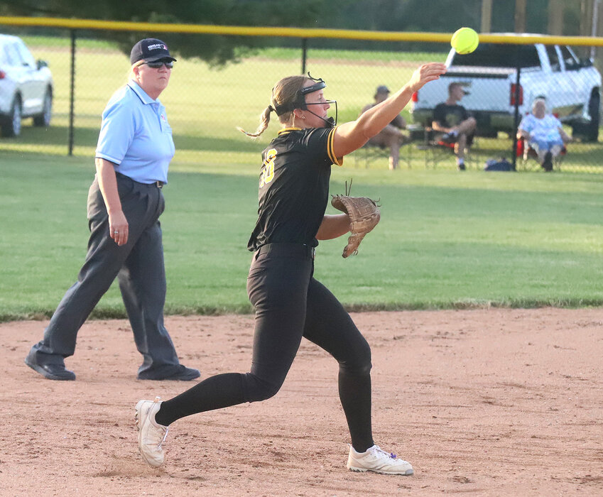 Central Lee's Shanna Buford fires a shot to first after scooping up a grounder to short as part of the Hawks' 9-8 win over West Burlington Notre Dame Friday in Donnellson.